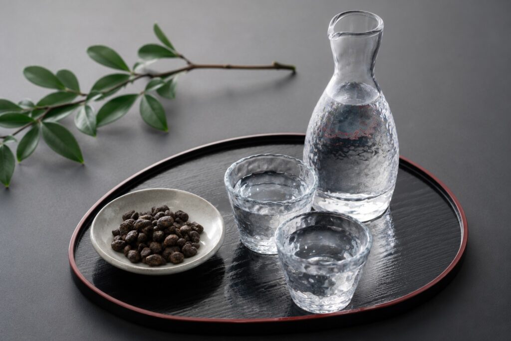 Hamanatto served with Japanese sake